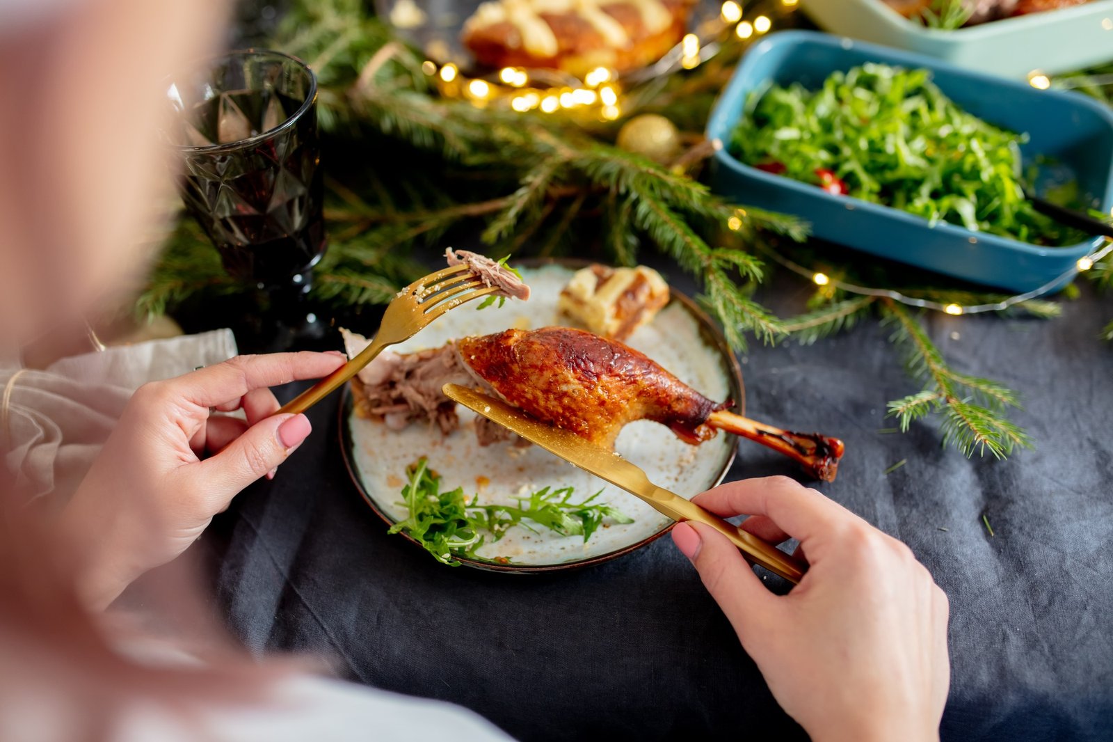 Above view on how person eating meal on Christmas dinner