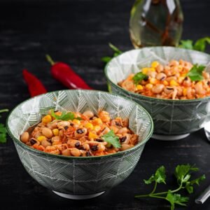 Chili con carne in bowl - traditional dish of mexican cuisine.